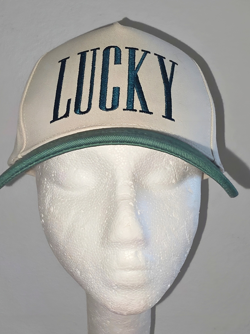 2 NWT Cream & green baseball cap with the word 'LUCKY' on front O/S Windsor